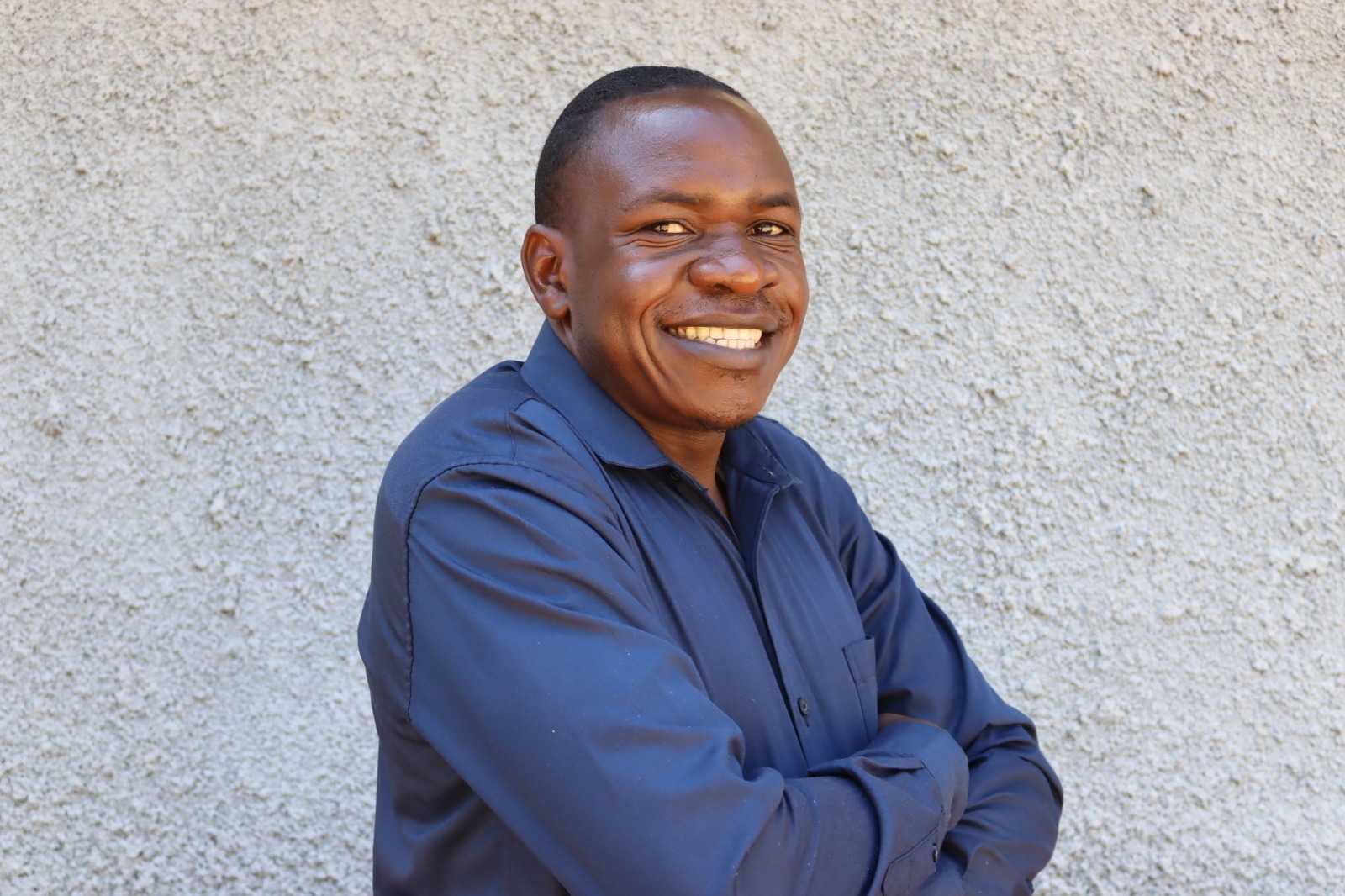 Dr. Joshua Okise